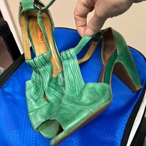 Miz Mooz Green leather peek a boo toes.